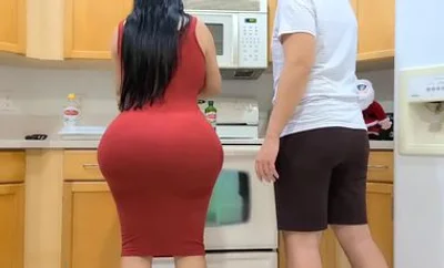 The big ass mother was cooking in the kitchen and her son came up to touch her big tits and made her lift her legs and thrust into her