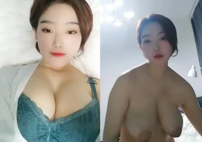 A beautiful girl with big breasts and short hair shows her breasts and pussy. Her big breasts and pink pussy are very tempting!