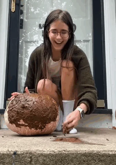 Public poop painting pumpkin