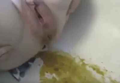 Woman poops hard in the bathtub