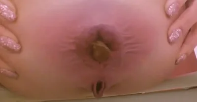 Close up view of butt stretching in toilet