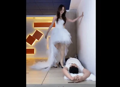 Beautiful bride tortures slaves