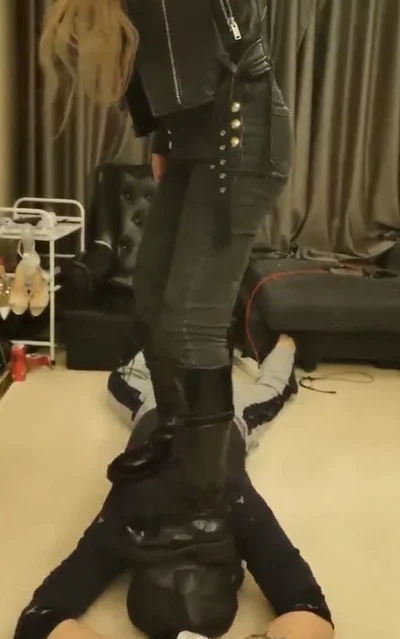 Leather boots crush slaves