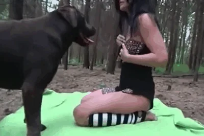 Skinny girl gets on the floor and has sex with a dog