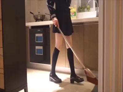 JK changing socks in the kitchen.